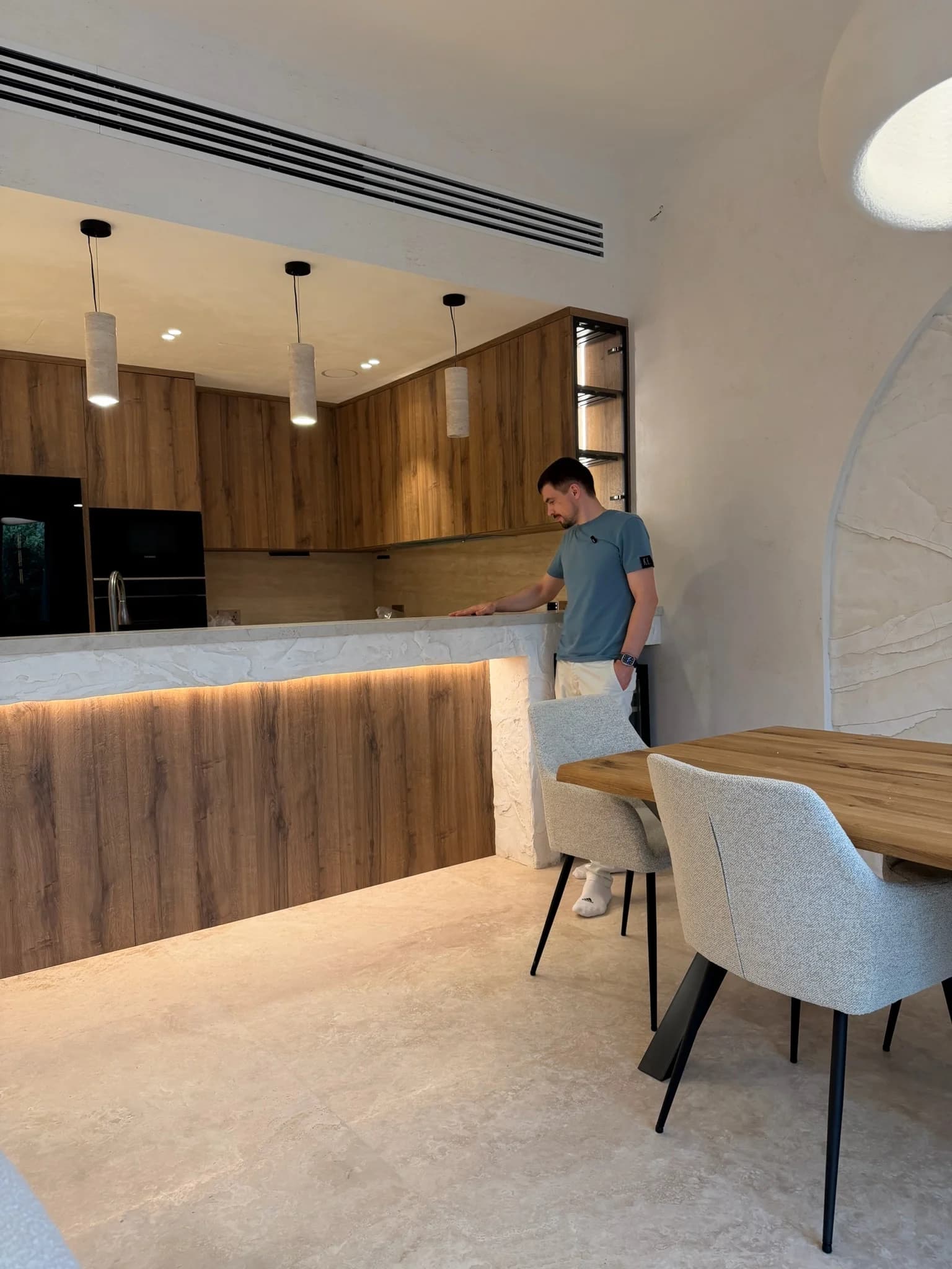 Comfort Stroy team member reviewing a completed Dubai renovation